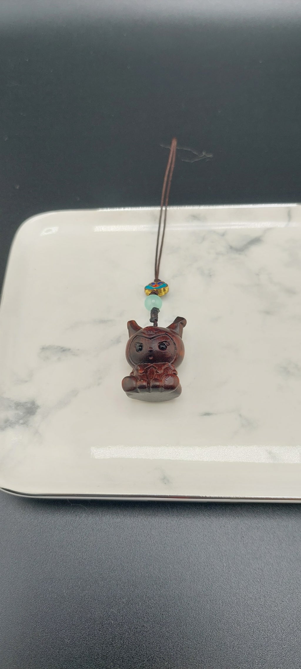 kuku wooden phone or bag charm 