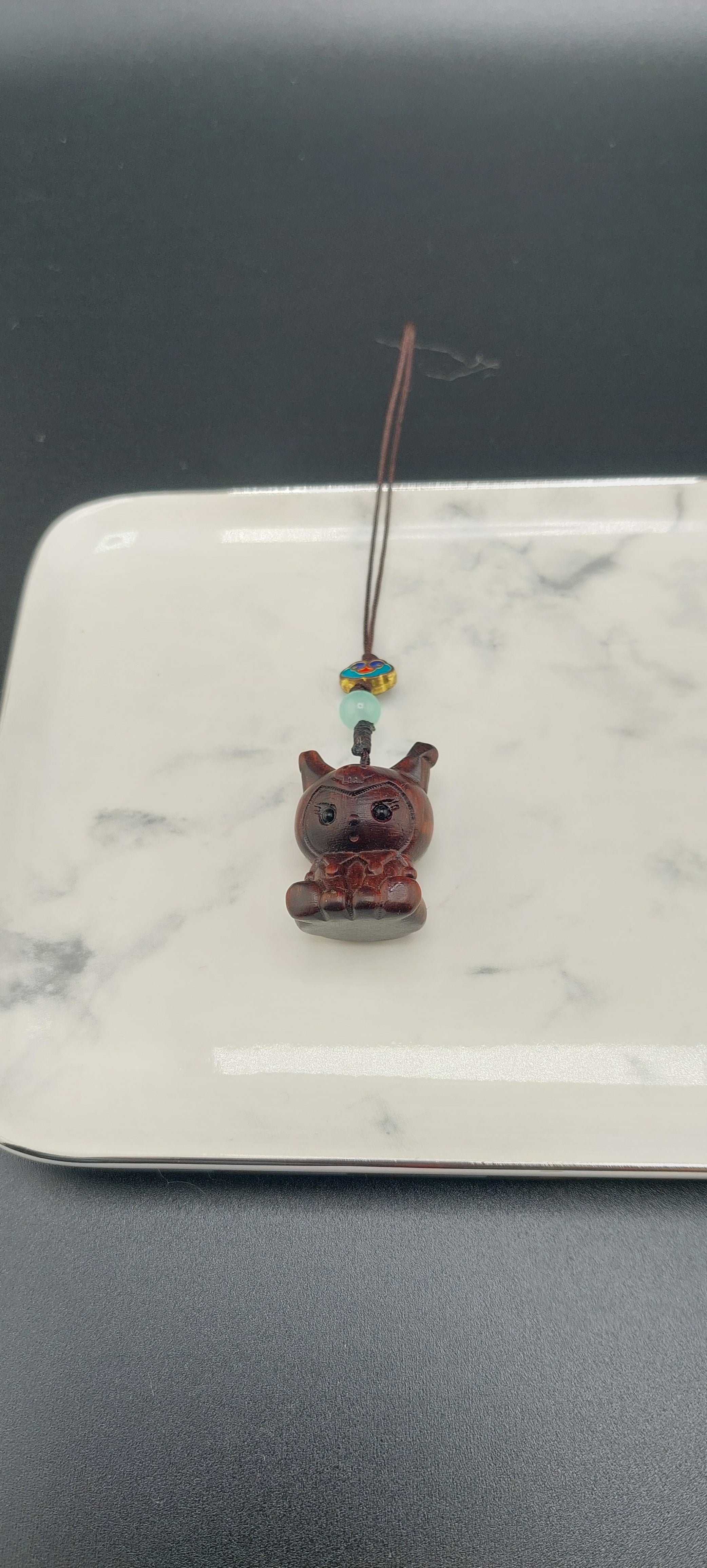 kuku wooden phone or bag charm 
