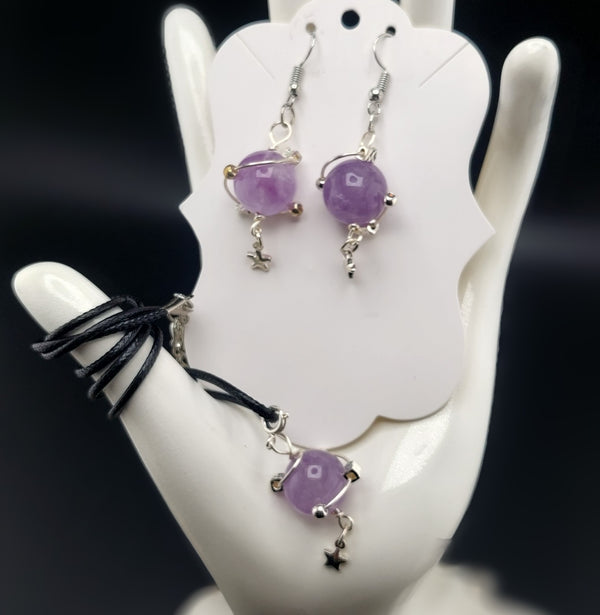 A set of jewelry featuring amethyst stones, displayed on a white mannequin. The set includes a bracelet and matching earrings.