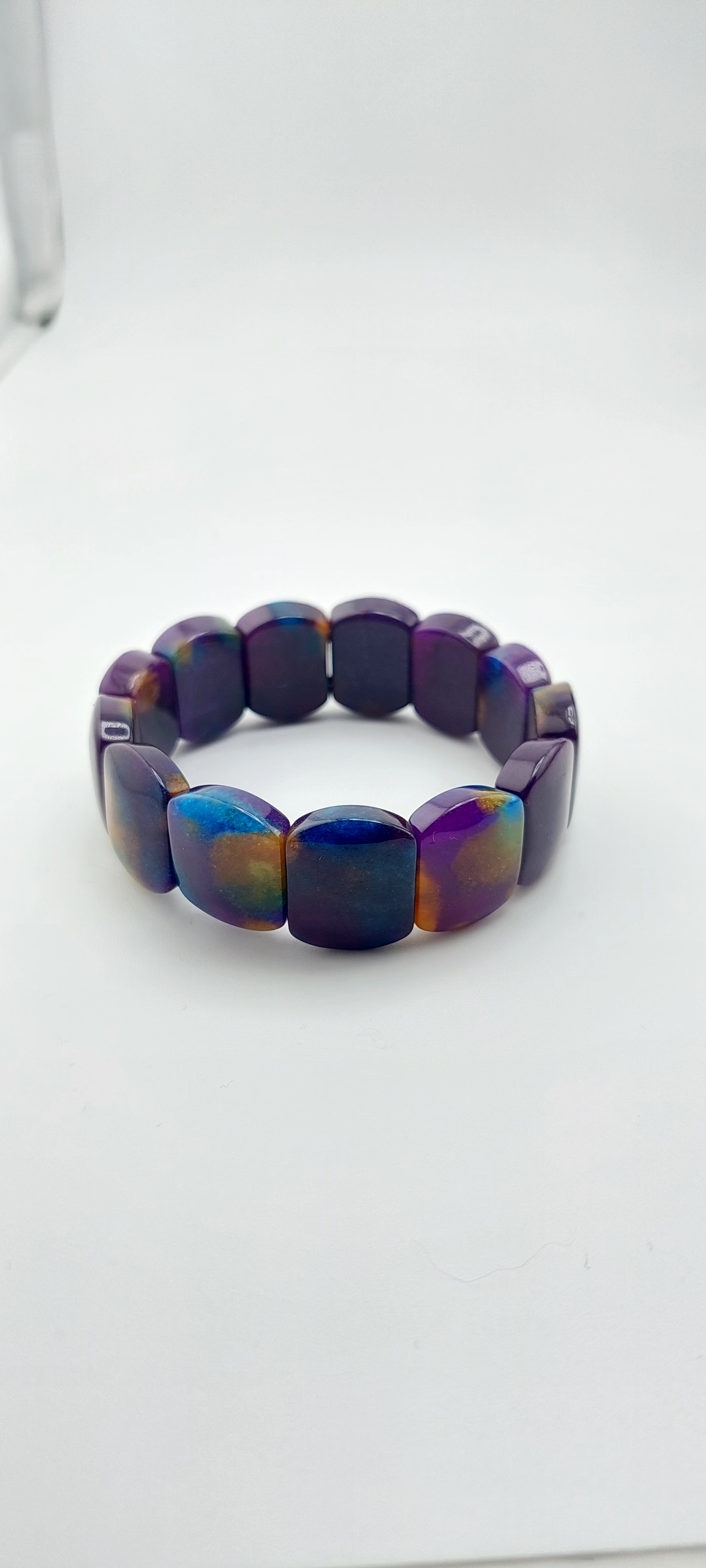 Multicolored beaded bracelet on a white background