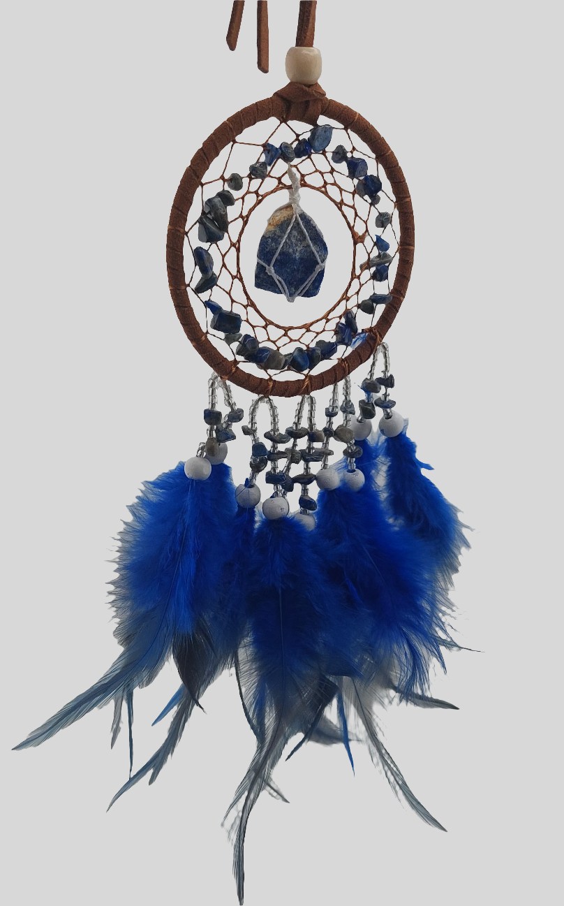 A dream catcher with a blue and white feathered design, featuring a circular card with a blue stone in the center, and adorned with beads and a leather strap.
