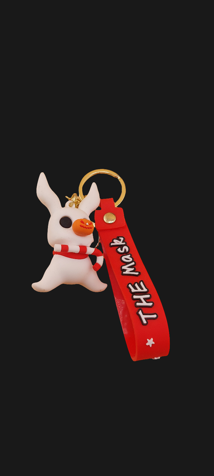 A keychain featuring an animated character from 'The Nightmare Before Christmas' attached to a red strap 