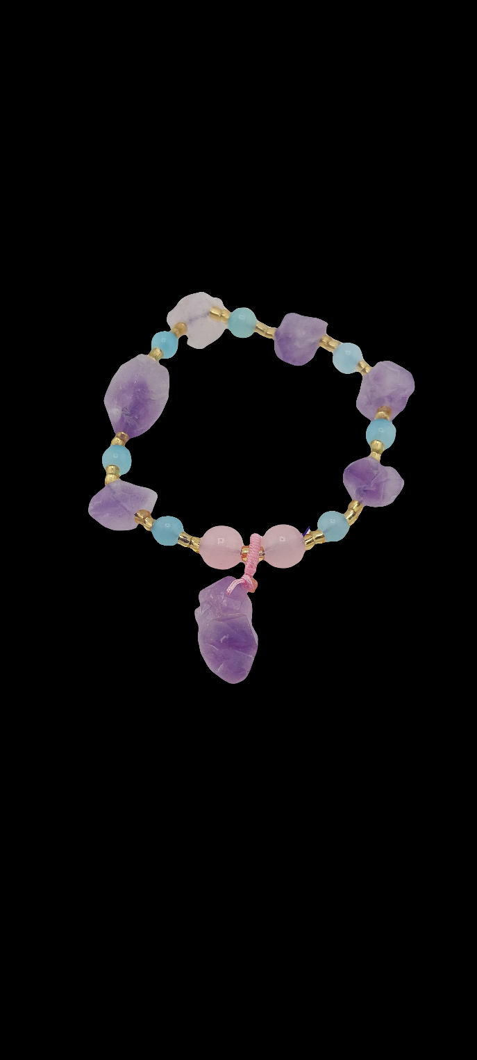 A beaded bracelet with natural amethyst stones and a charm.
