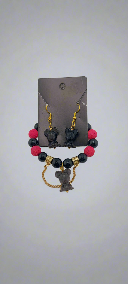 A set of Mickey Mouse themed jewelry including a bracelet and earrings with black, red, and gold colors.