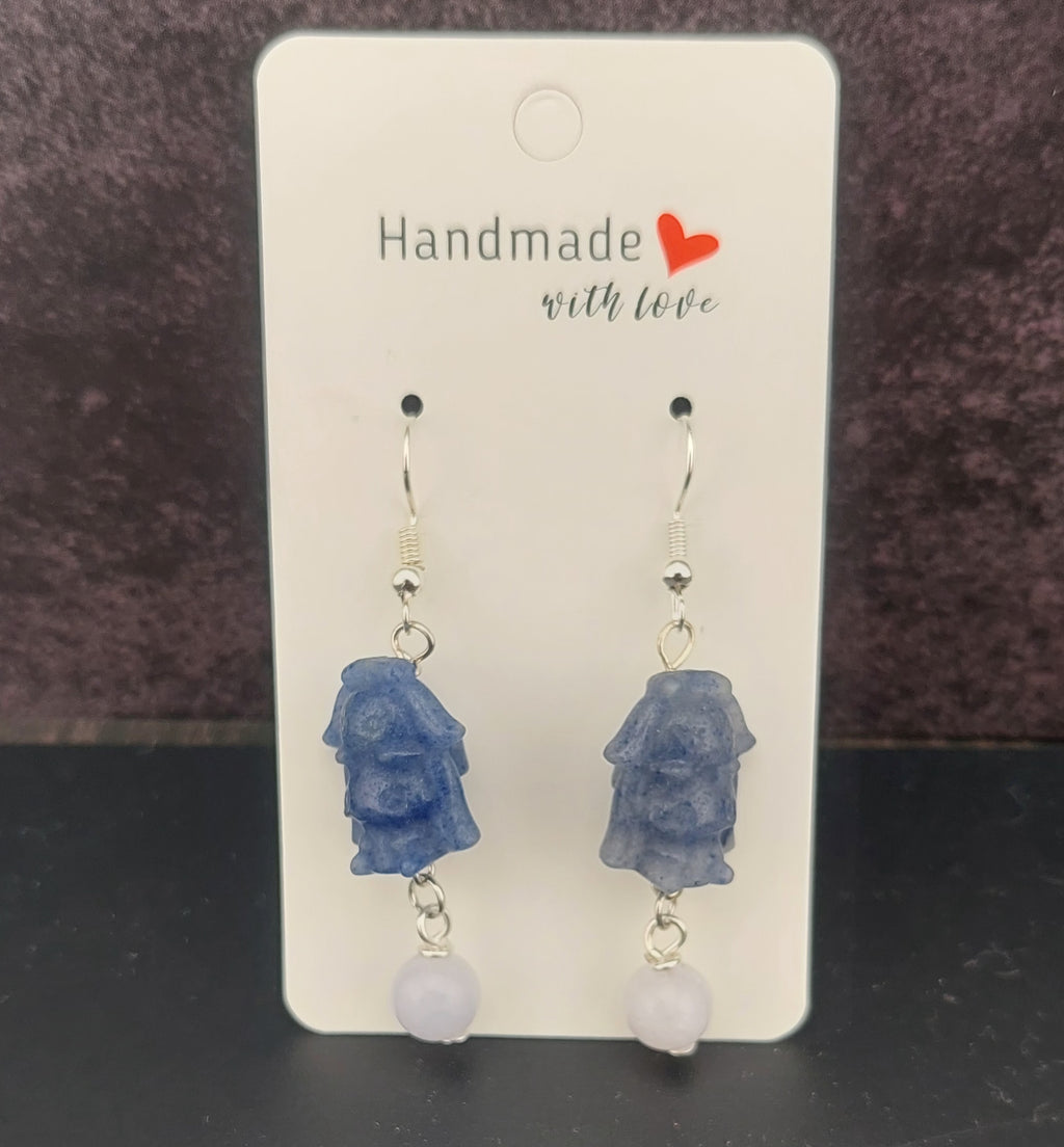 Blue stone and white bead earrings on a 'Handmade with Love' card.