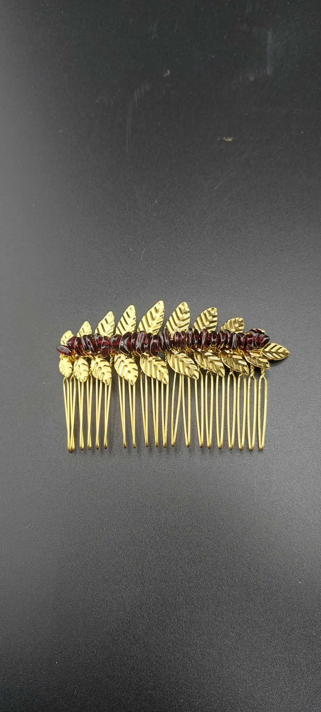 gold leaf hair clip made with healing stone garnet. by jade couture