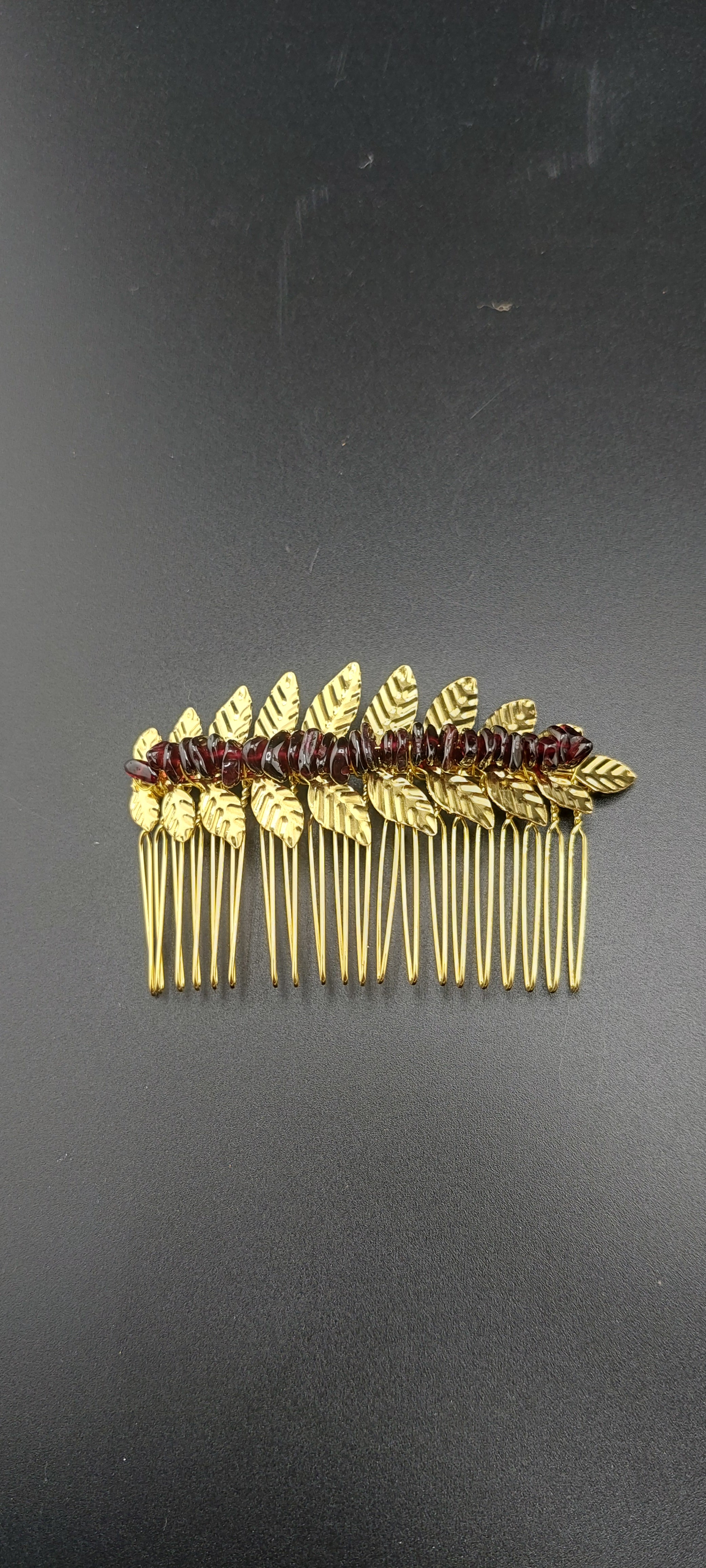 gold leaf hair clip made with healing stone garnet. by jade couture